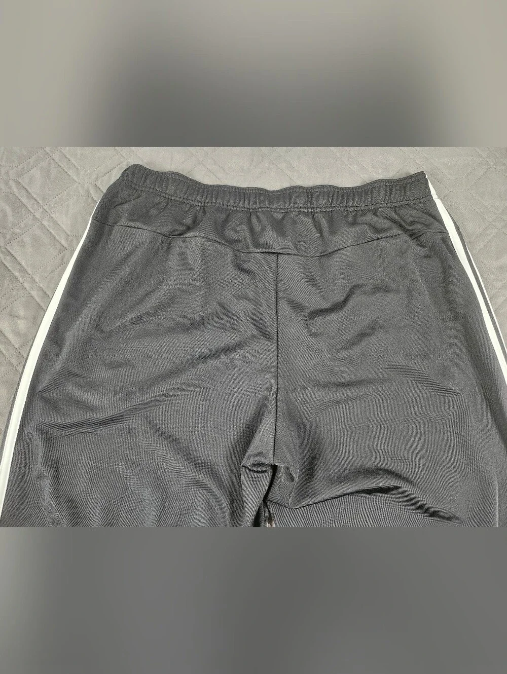 black Adidas activewear track pants white three-stripe detailing men's size XL
